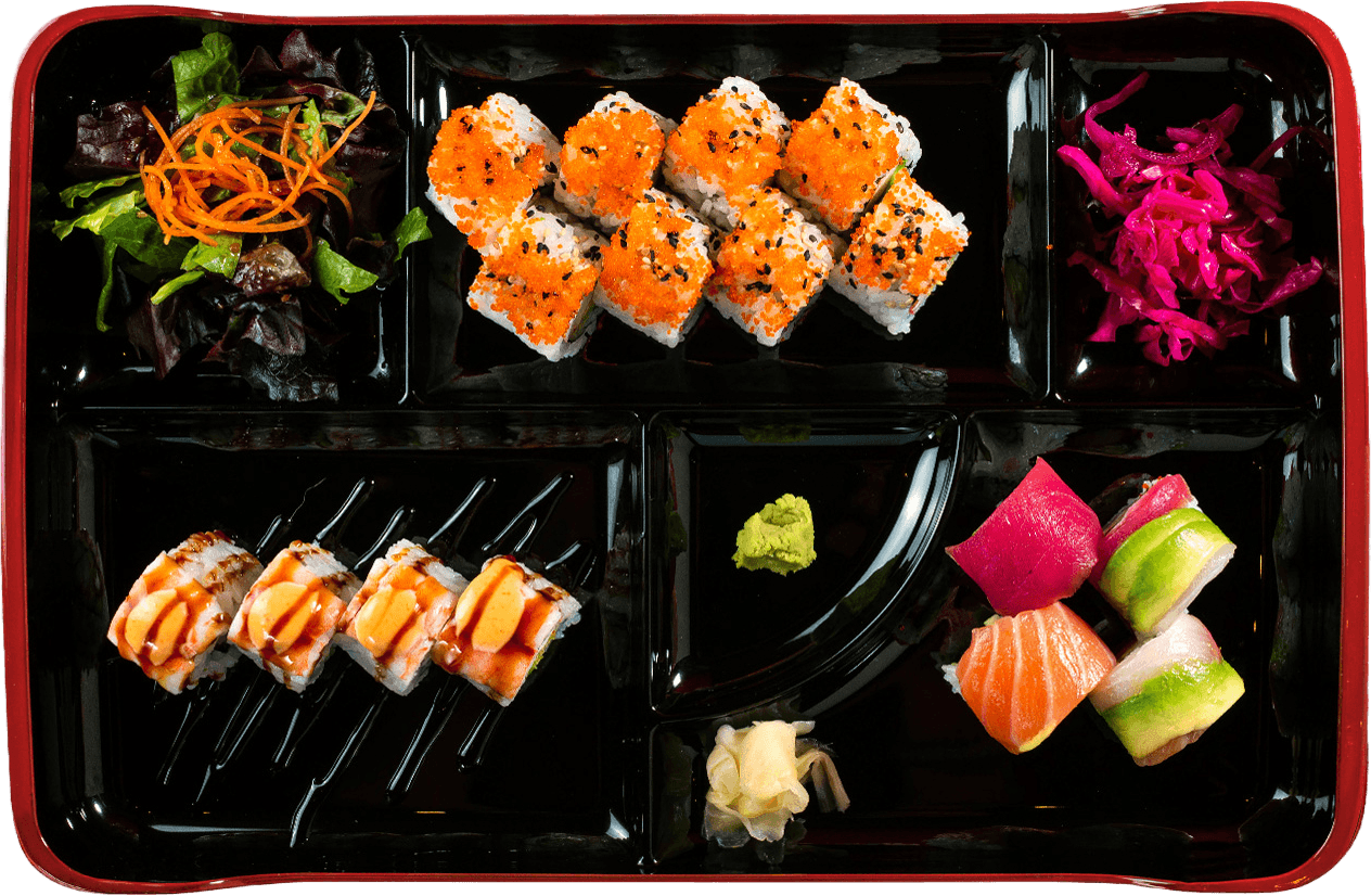 Bento box with assorted sushi rolls