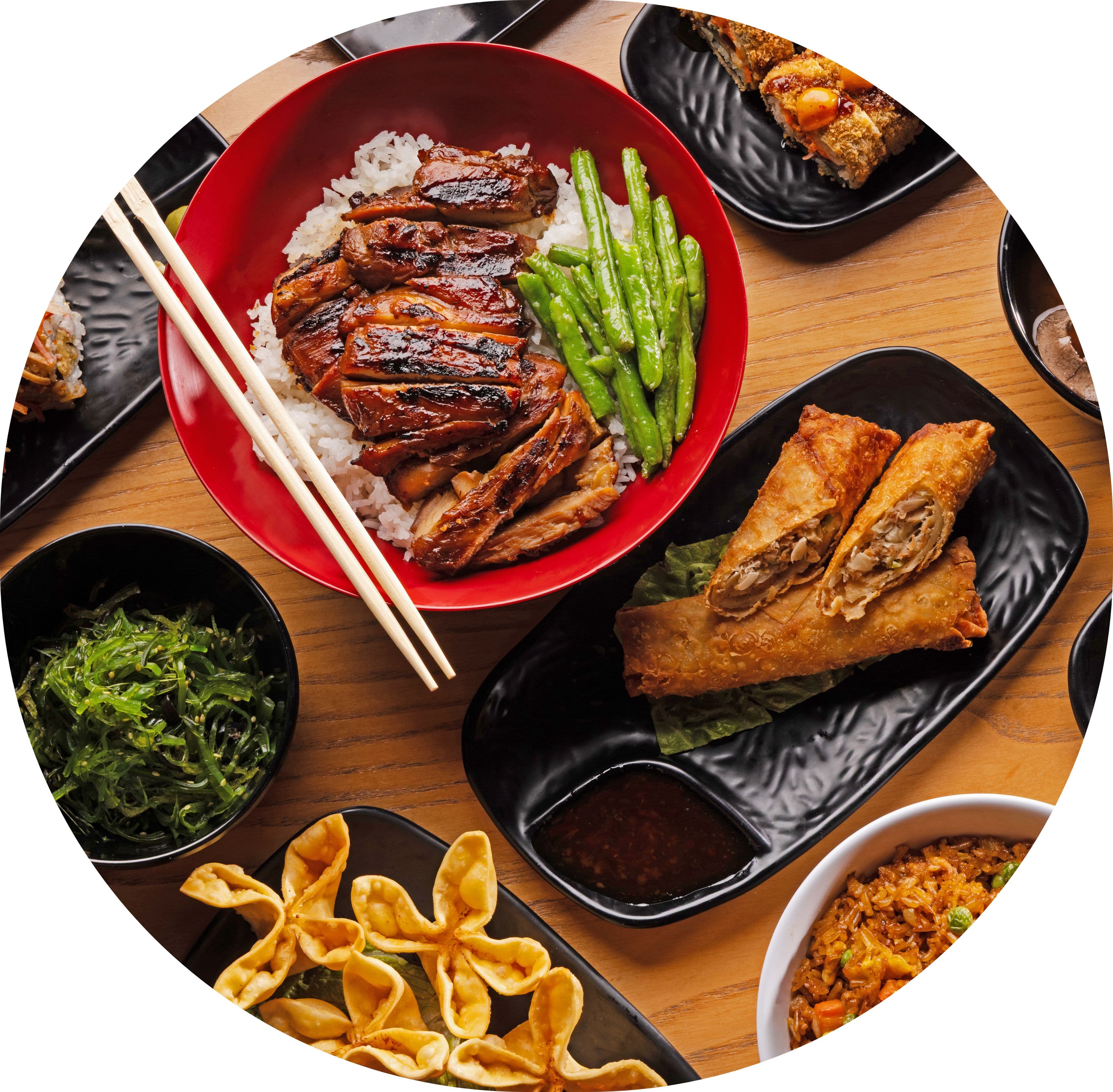 Assortment of BENTO Asian Kitchen dishes and sushi