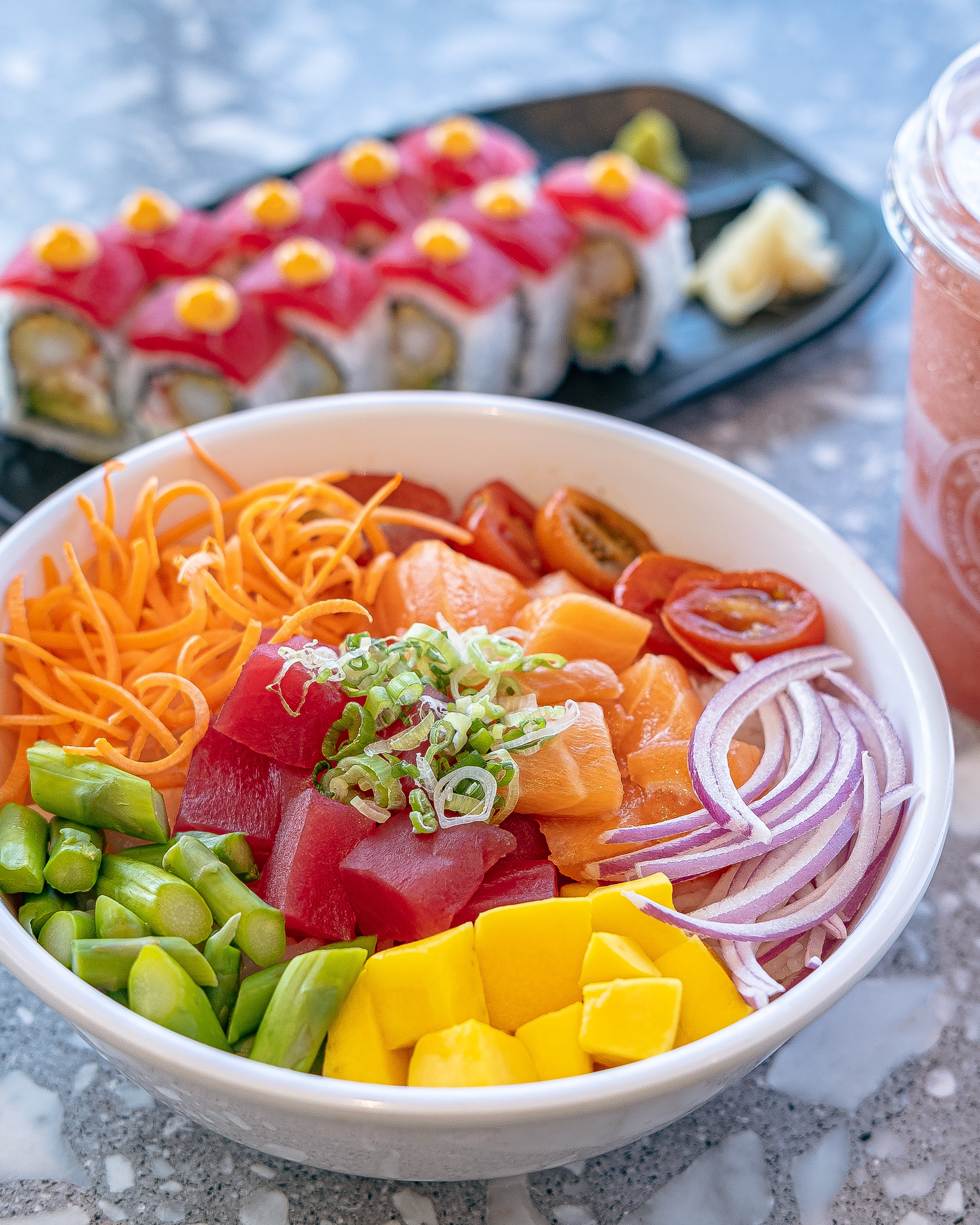 Poke bowl with tuna, salmon, and veggies